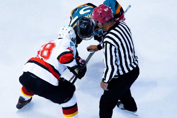 Hockey Players and a Referee