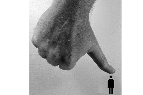 A Thumb Measuring a Person