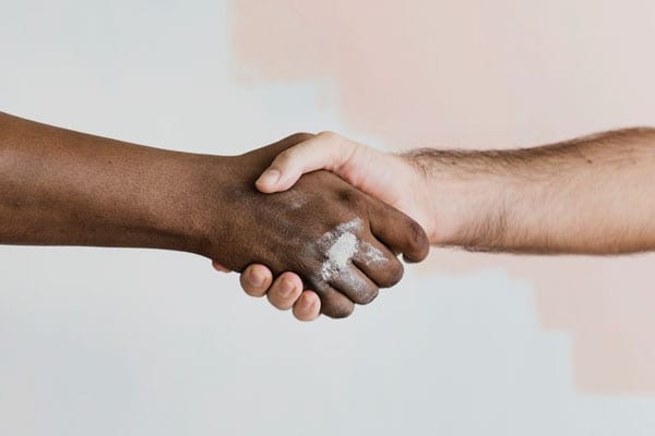 Two People Shaking Hands